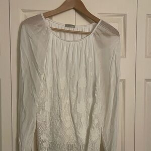 Sheer sleeved top with embroidered front.